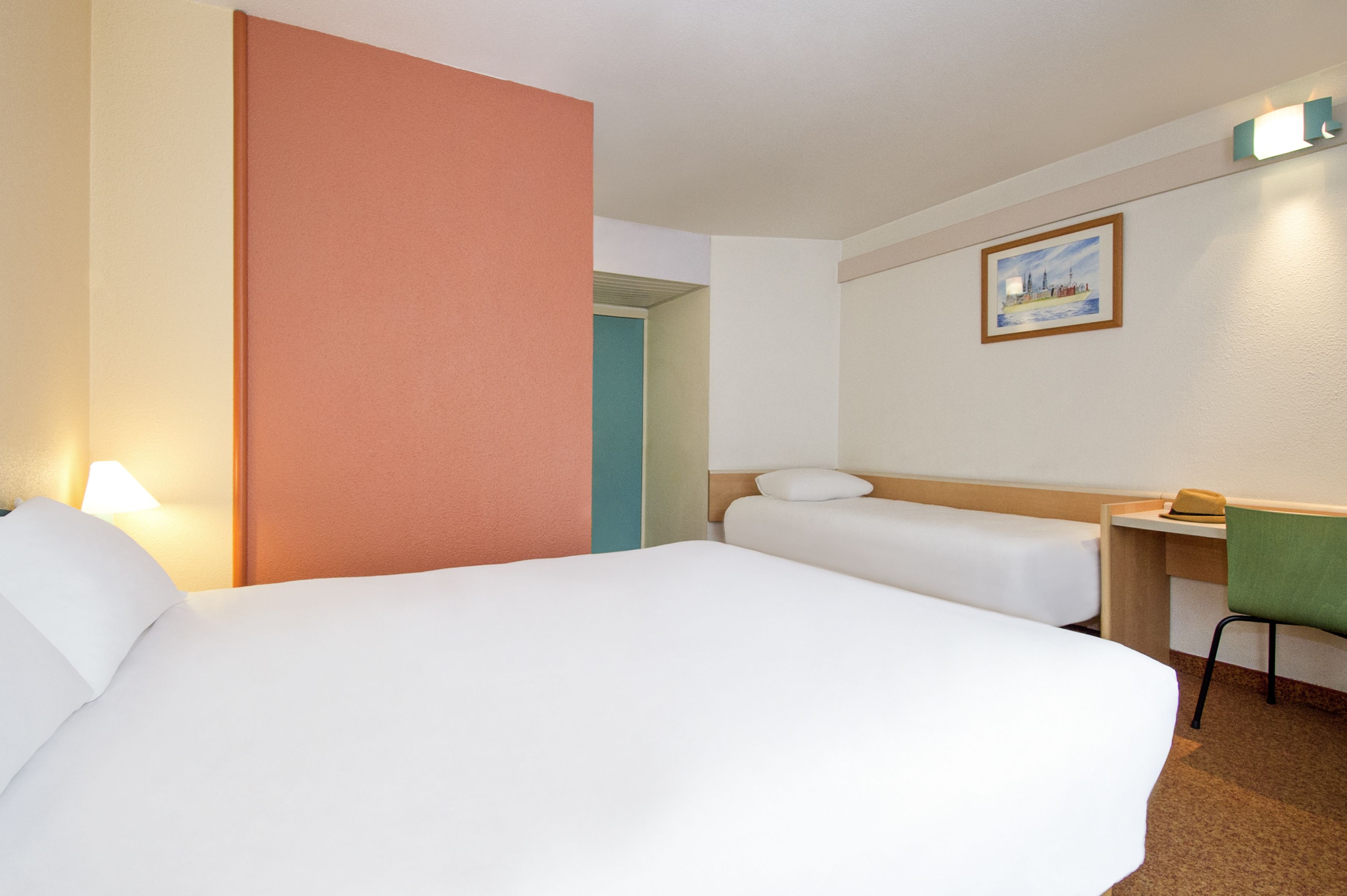 standard double room, multiple beds | in-room safe, individually decorated, individually furnished, desk