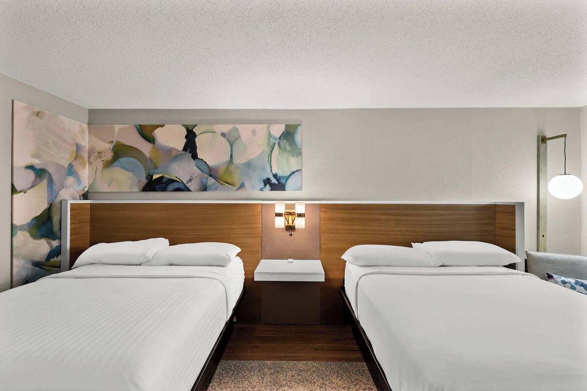 Down comforters, pillowtop beds, in-room safe, desk