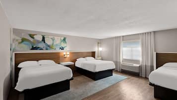 Down duvets, pillow-top beds, in-room safe, desk