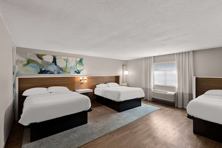 Down comforters, pillowtop beds, in-room safe, desk