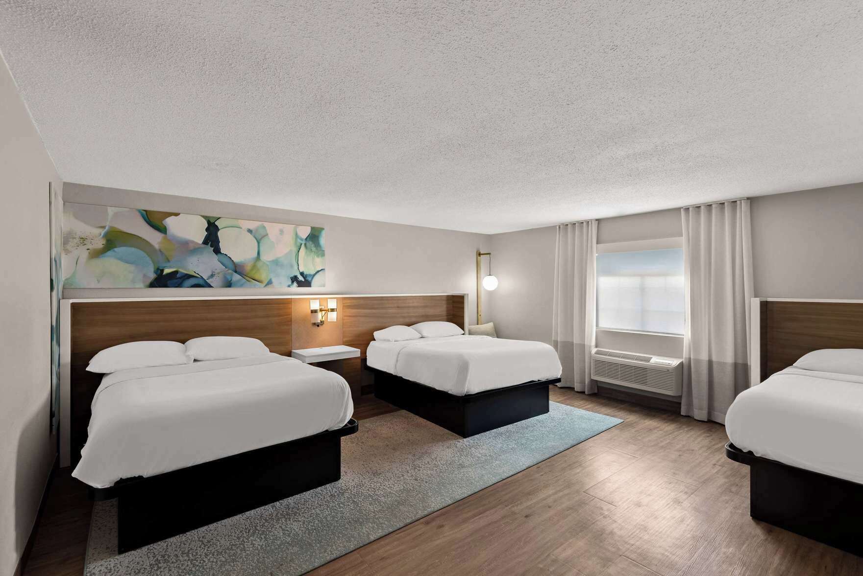 Down comforters, pillowtop beds, in-room safe, desk
