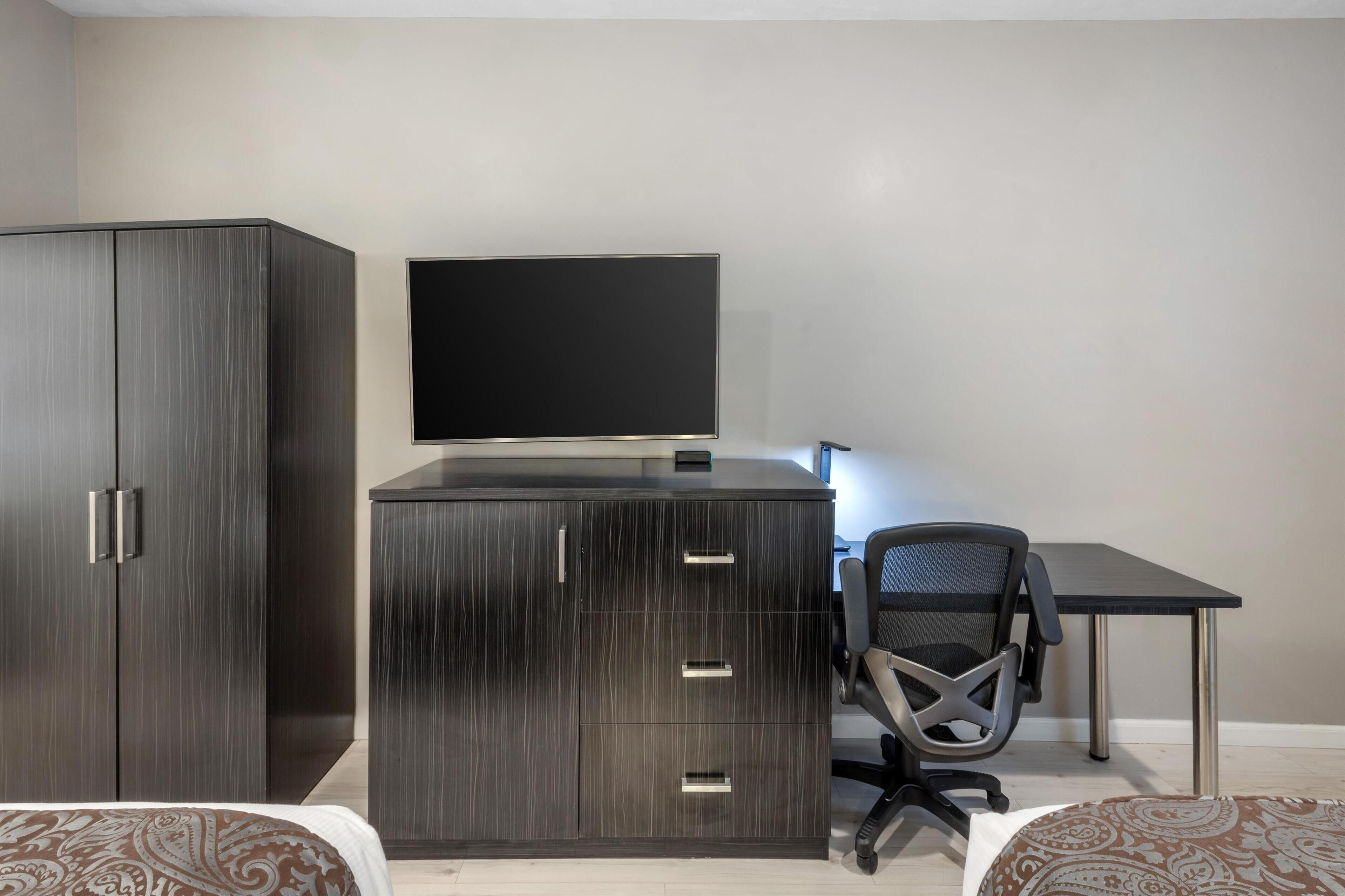 standard room, 2 queen beds, non smoking, refrigerator & microwave | in-room safe, iron/ironing board, free wifi, bed sheets