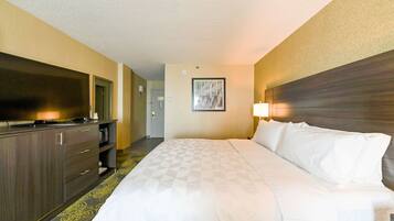 Premium bedding, desk, laptop workspace, iron/ironing board