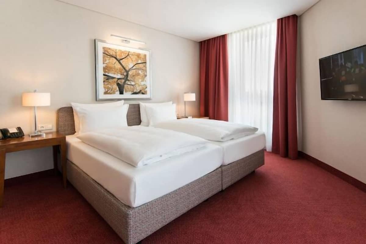 Down duvets, minibar, in-room safe, desk