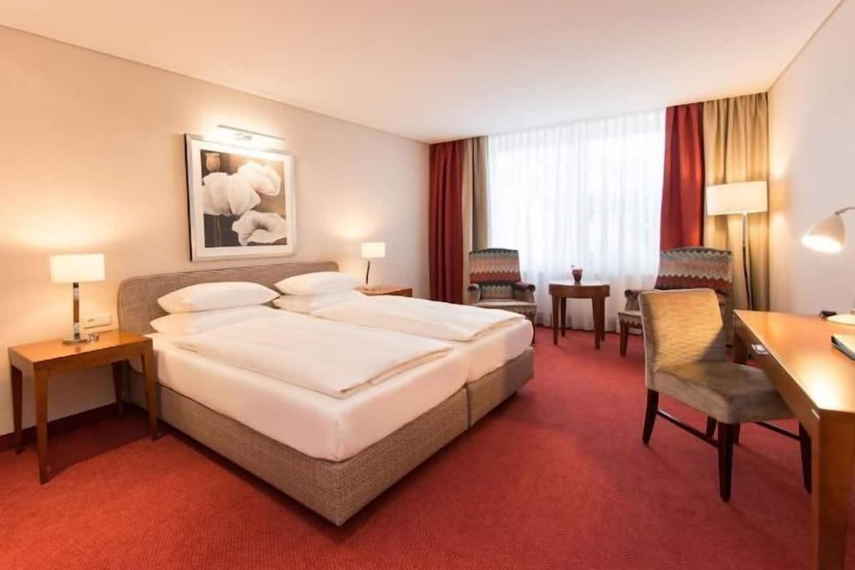 Down duvets, minibar, in-room safe, desk