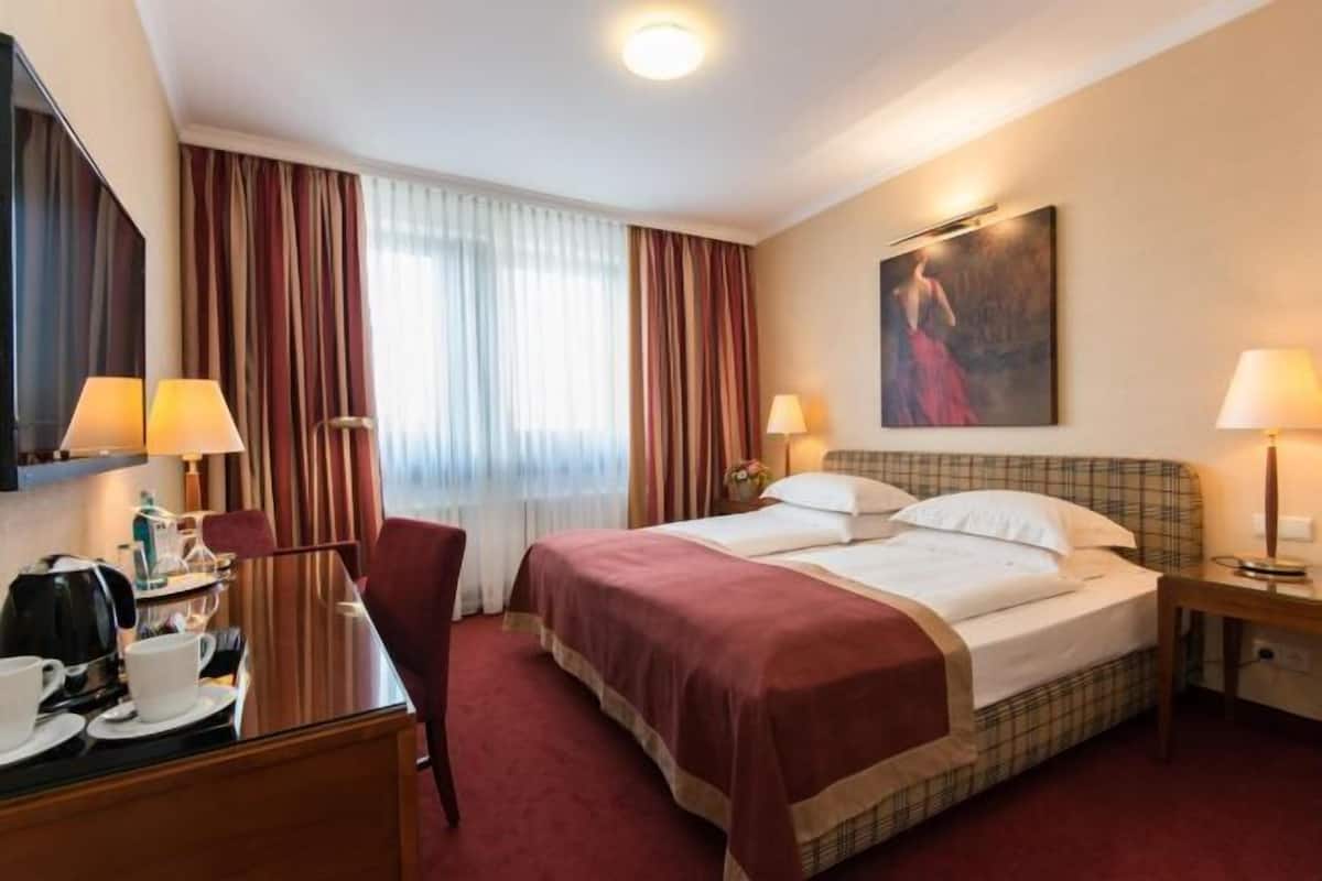 Down duvets, minibar, in-room safe, desk