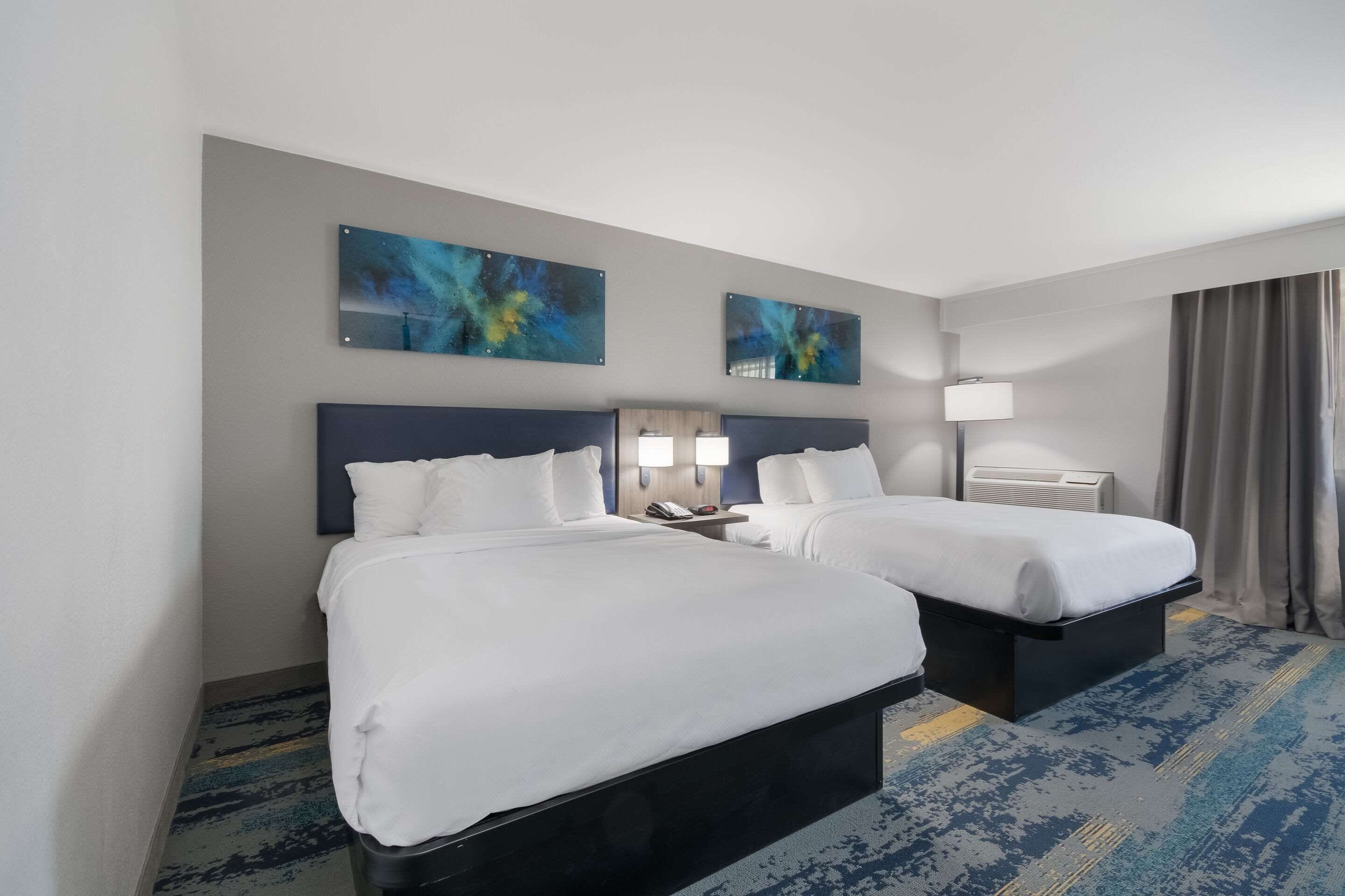 standard room, 2 queen beds, non smoking | premium bedding, desk, laptop workspace, blackout curtains