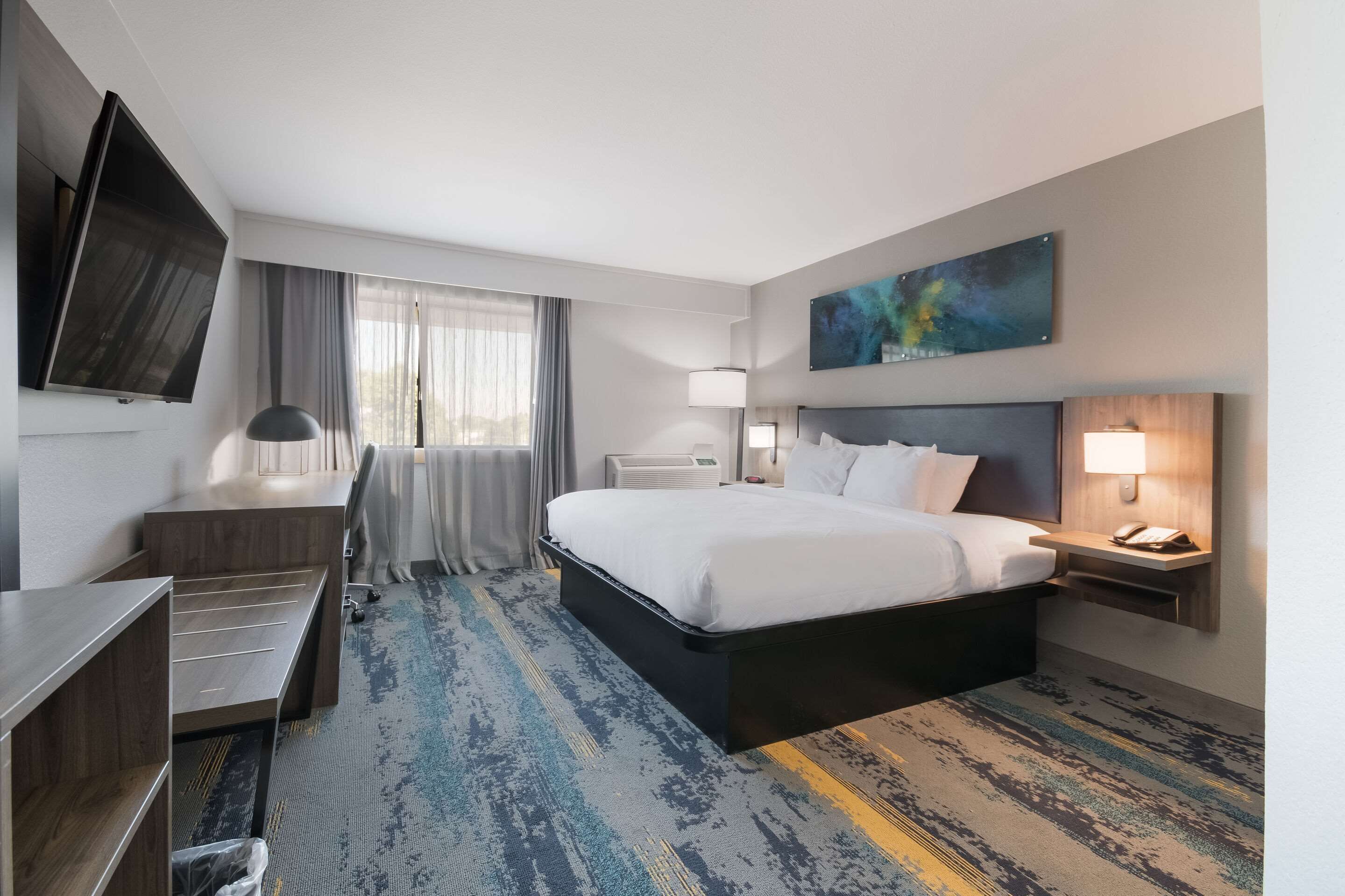 standard room, 1 king bed, non smoking | premium bedding, desk, laptop workspace, blackout curtains