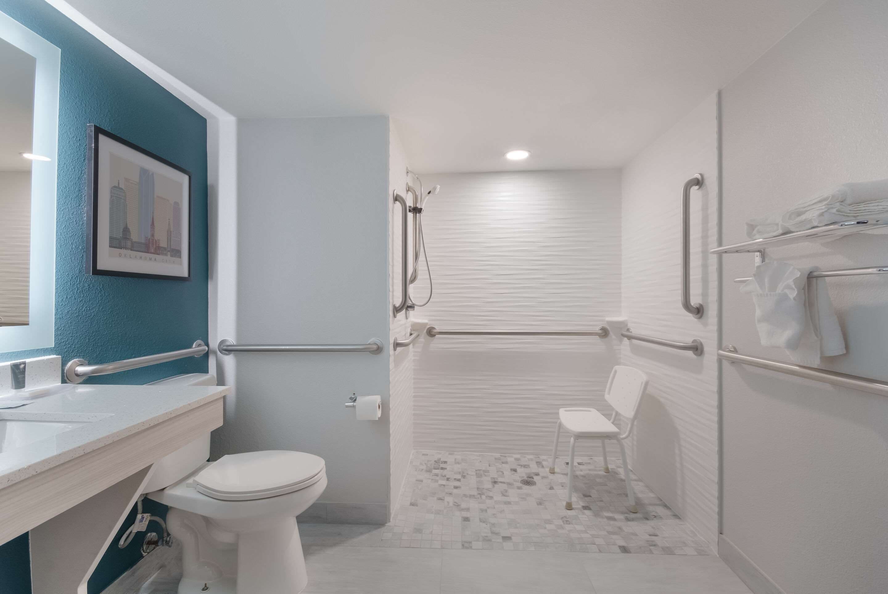 combined shower/bathtub, free toiletries, hair dryer, towels