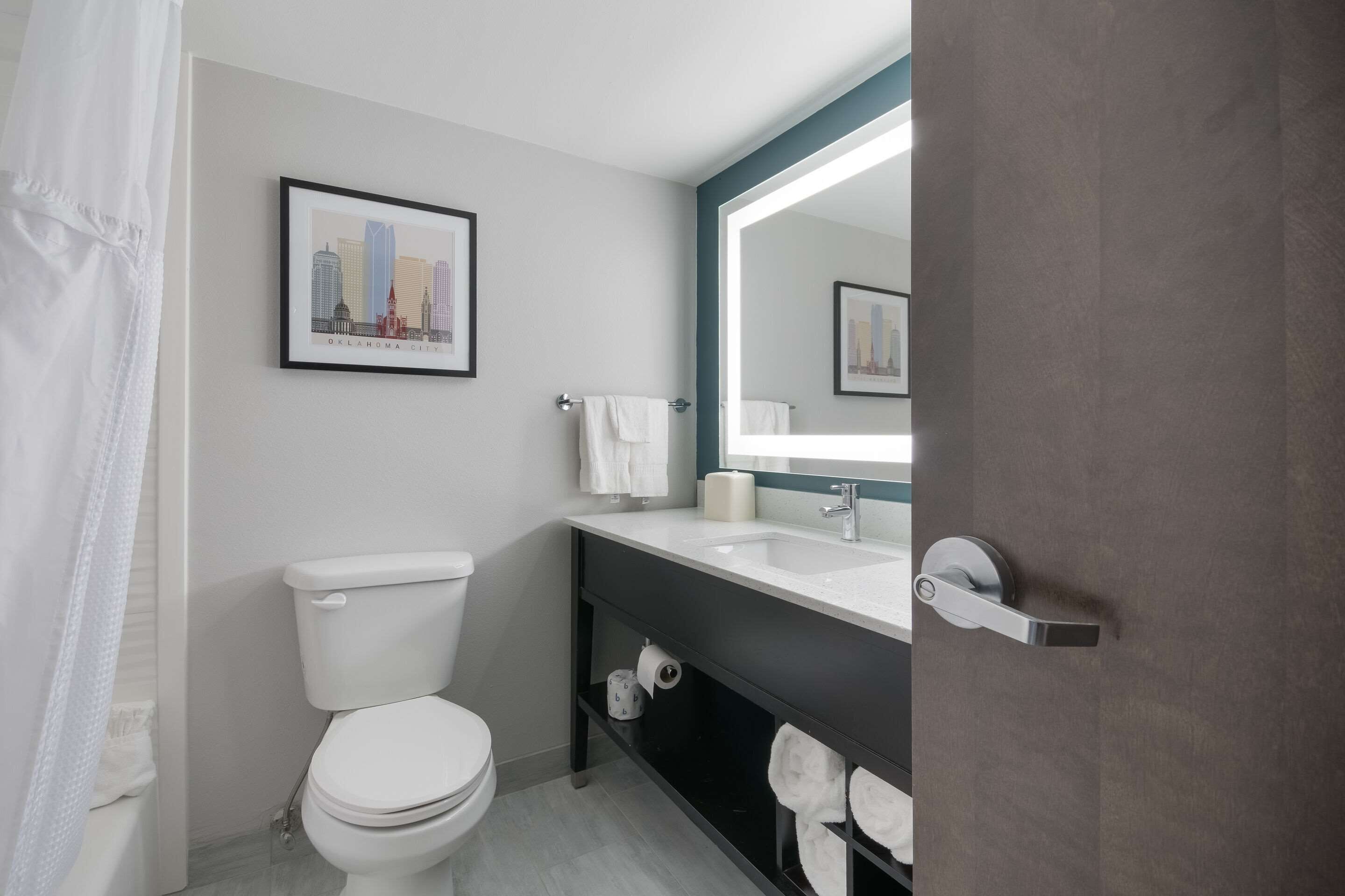 combined shower/bathtub, free toiletries, hair dryer, towels