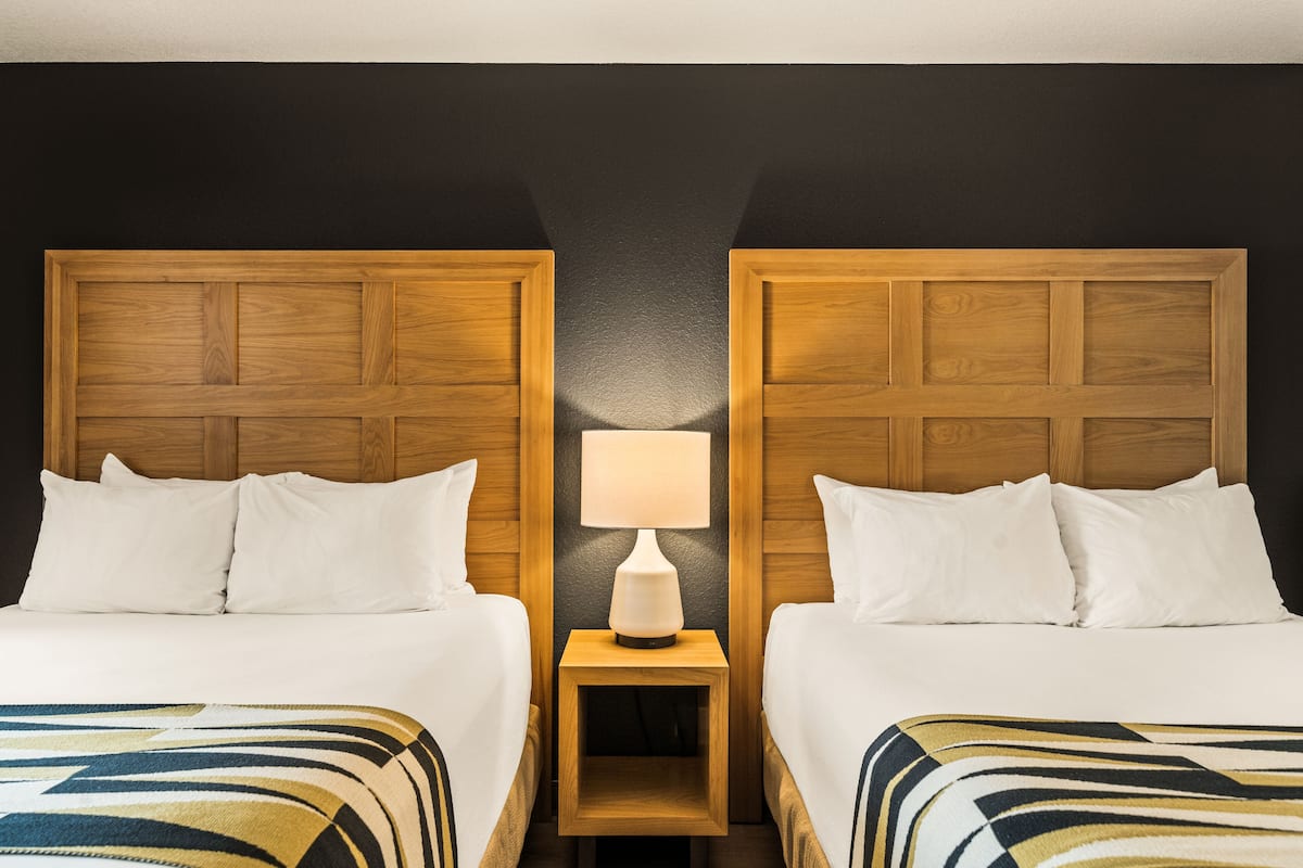 executive 2 queen suite | premium bedding, desk, blackout curtains, iron/ironing board