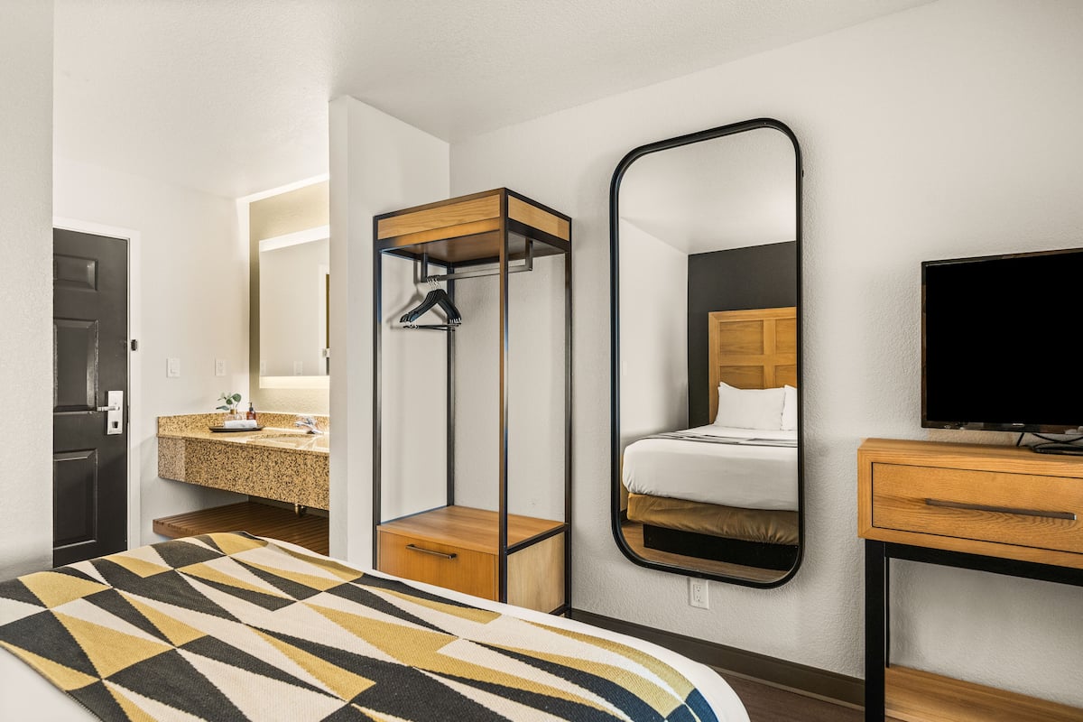 executive 2 queen suite | premium bedding, desk, blackout curtains, iron/ironing board