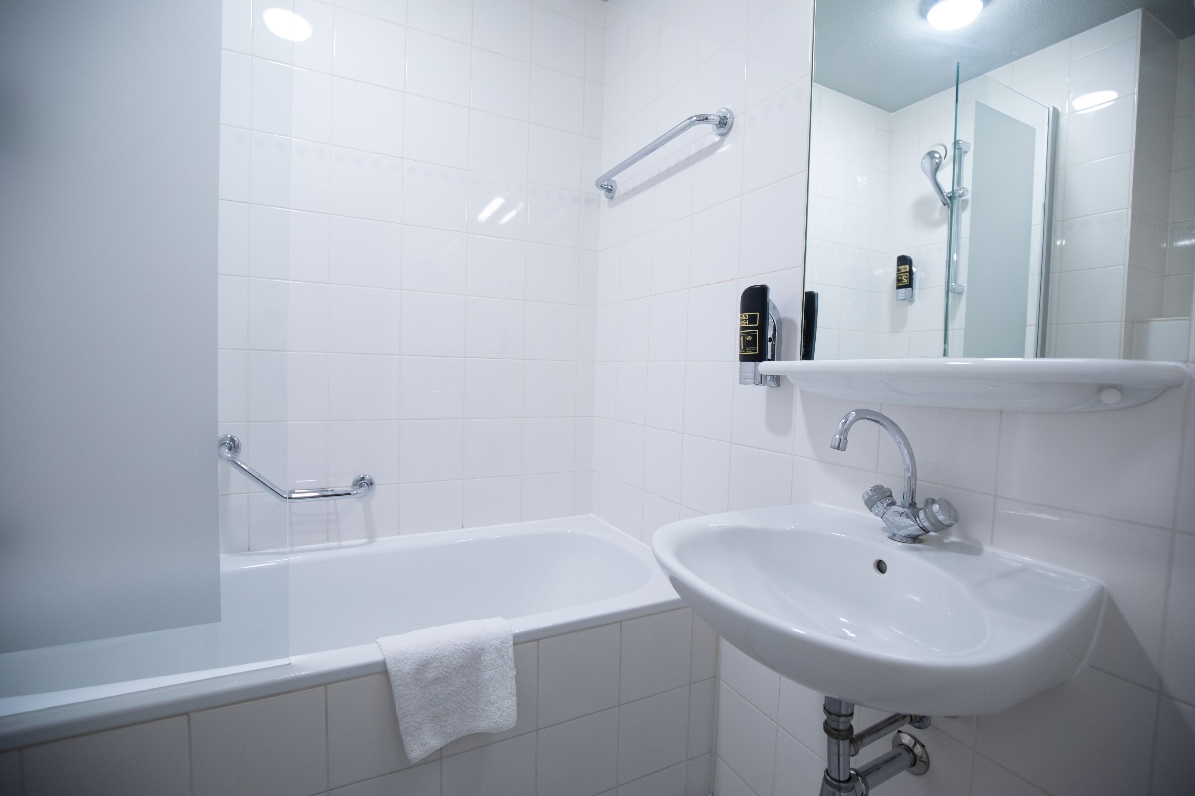 shower, eco-friendly toiletries, hair dryer, soap