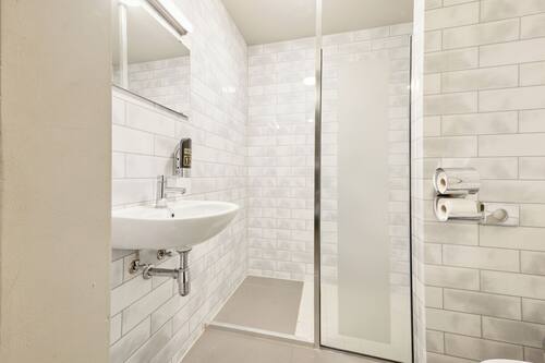 Shower, eco-friendly toiletries, hair dryer, soap