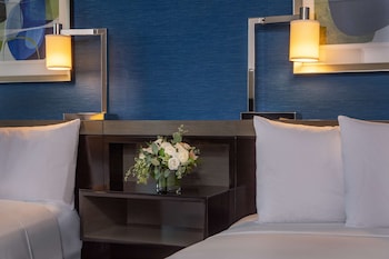 Egyptian cotton sheets, premium bedding, pillowtop beds, in-room safe at The Royal Sonesta Boston