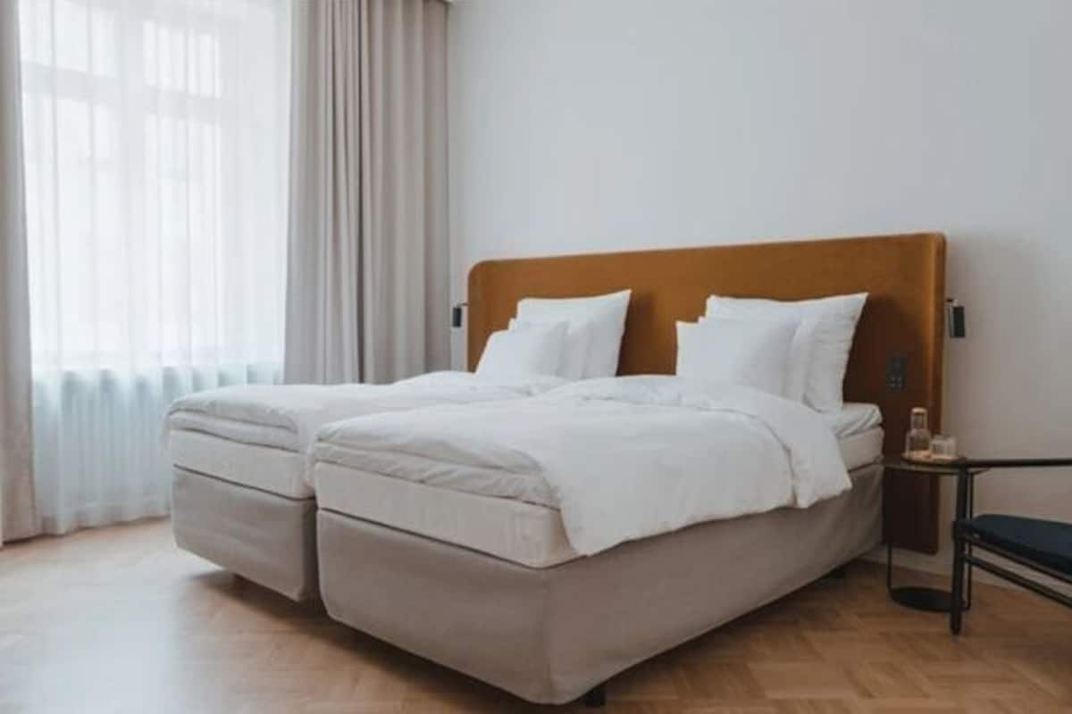 Literie de qualité supérieure, coffres-forts dans les chambres, bureau