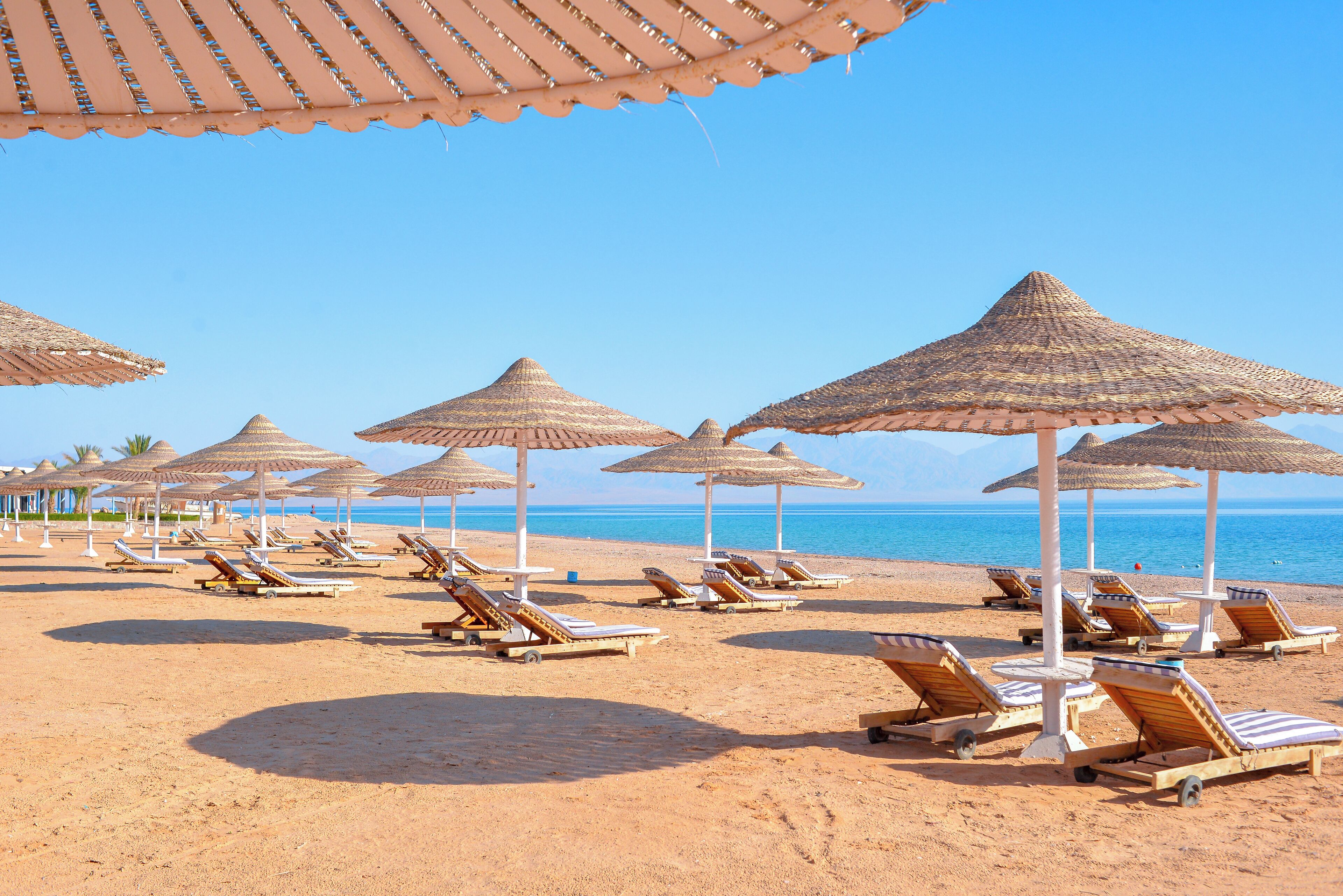Private beach, beach umbrellas, beach towels, beach massages