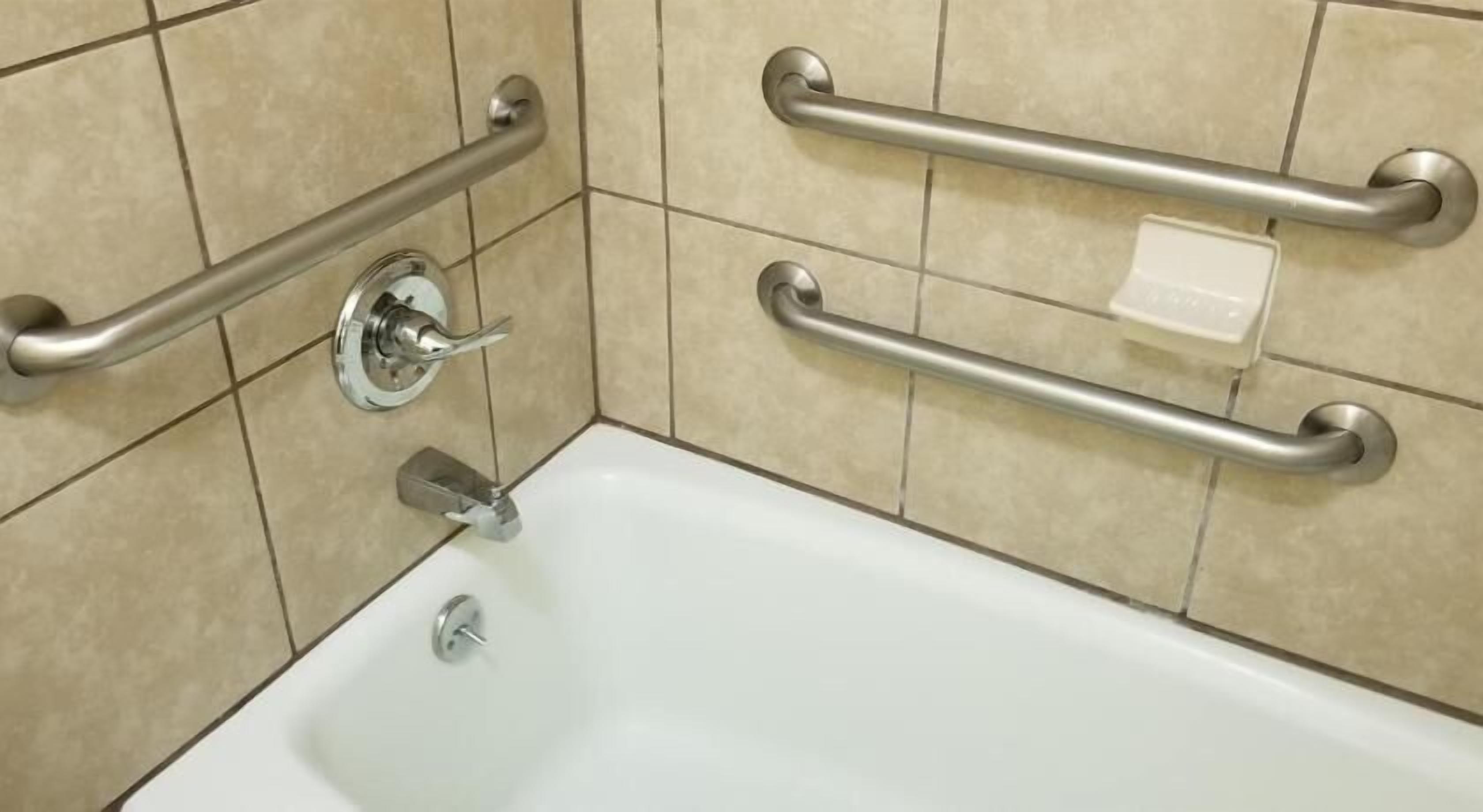 Baño | Artículos de higiene personal gratuitos, secador de pelo y toallas