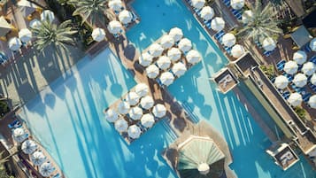 Outdoor pool, open 8:00 AM to 10:00 PM, cabanas (surcharge)