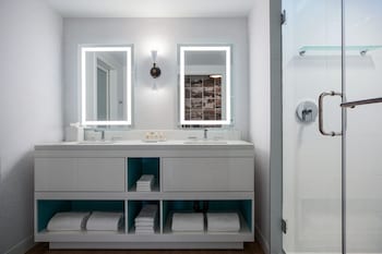 Combined shower/tub, designer toiletries, hair dryer, towels at Renaissance Esmeralda Resort & Spa, Indian Wells