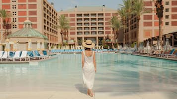 Outdoor pool, open 8:00 AM to 10:00 PM, pool cabanas (surcharge)