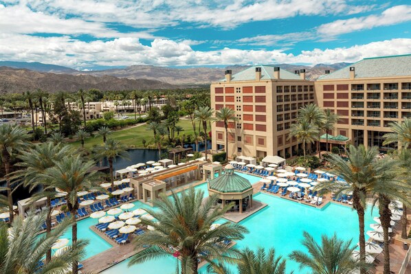Outdoor pool, open 8:00 AM to 10:00 PM, pool cabanas (surcharge)