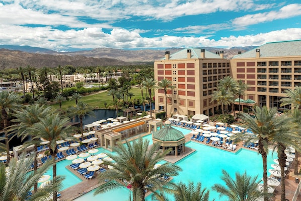 Outdoor pool, open 8:00 AM to 10:00 PM, pool cabanas (surcharge)