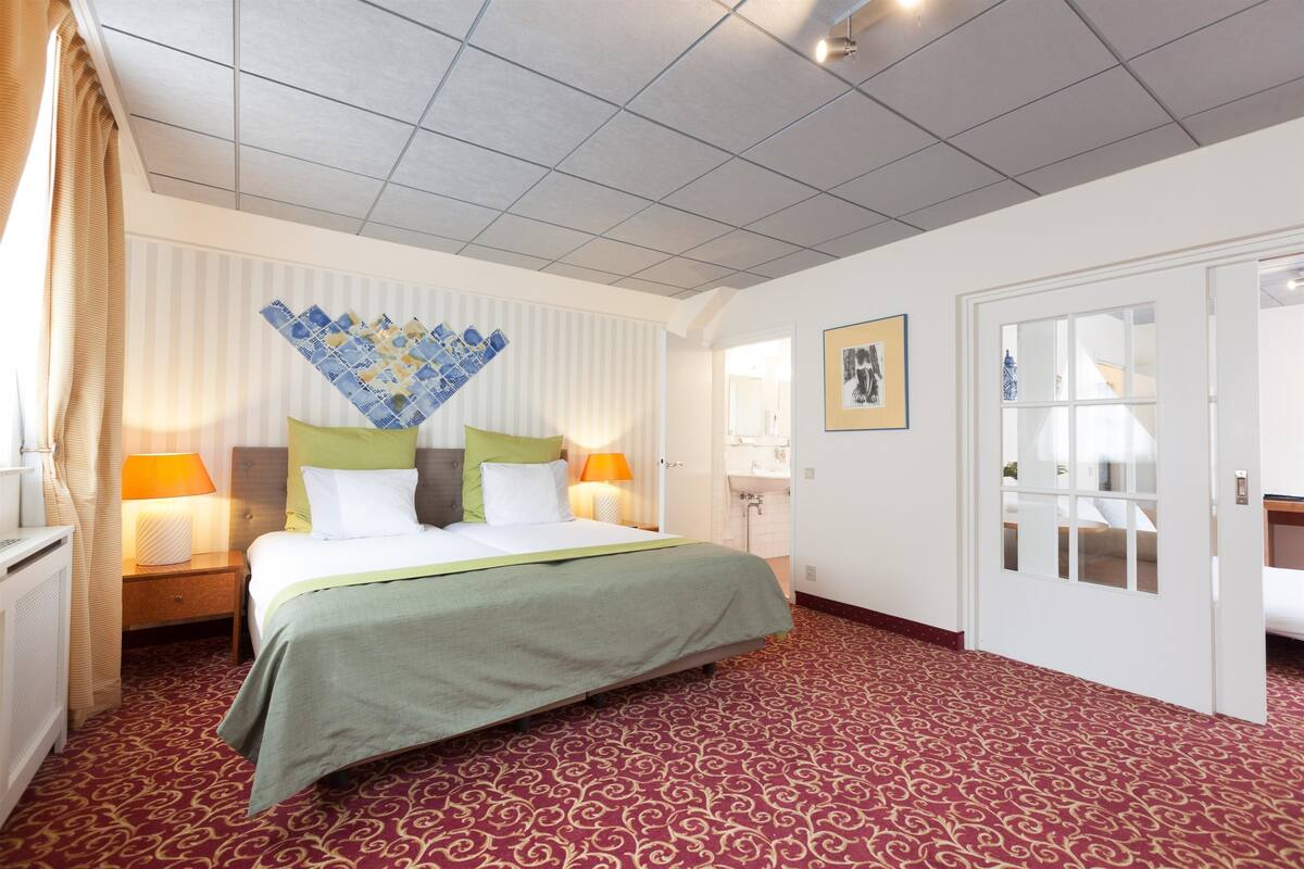 Suite, 2 Twin Beds (Living Room) | In-room safe, desk, laptop workspace, iron/ironing board (on request)