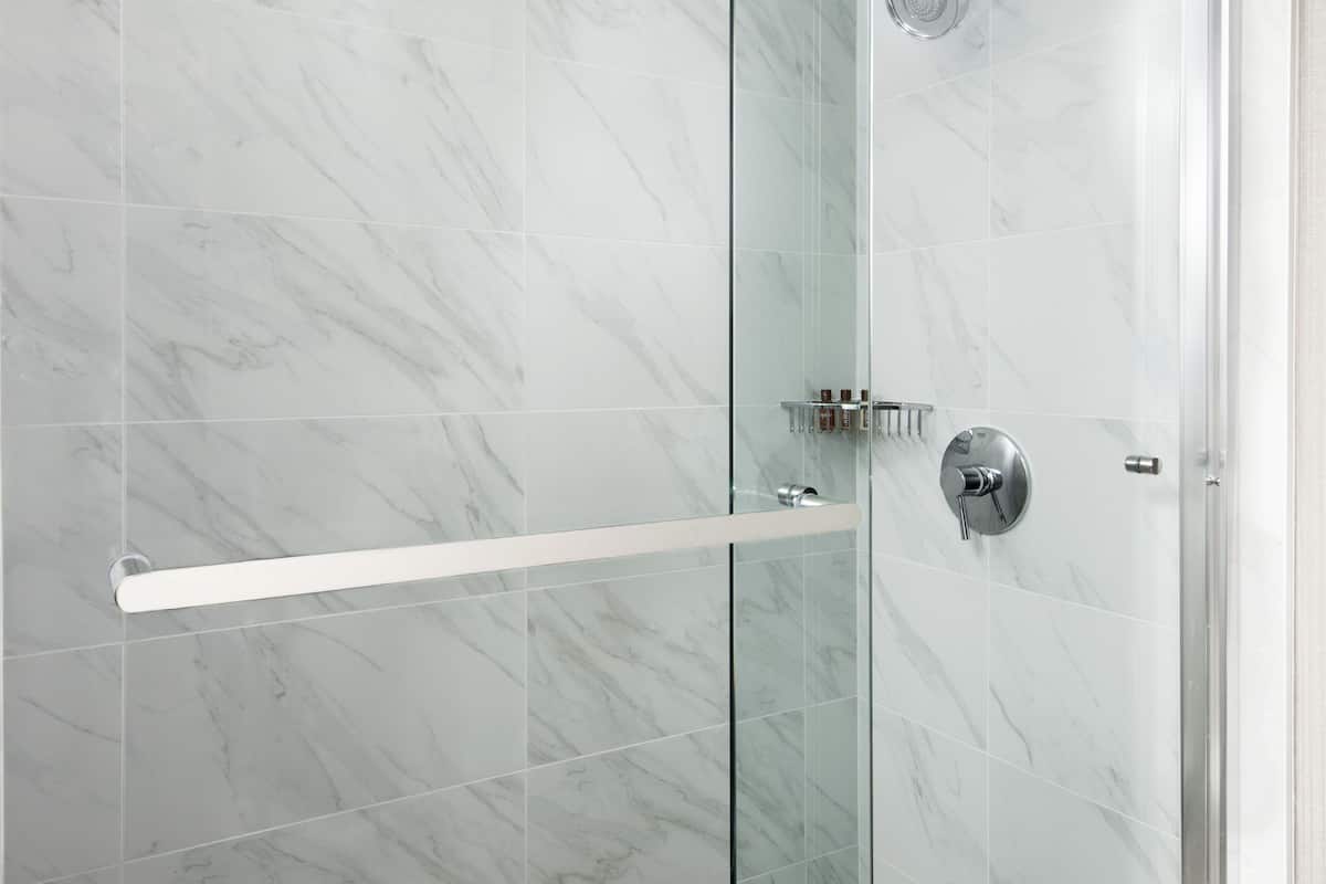 shower, eco-friendly toiletries, hair dryer, towels