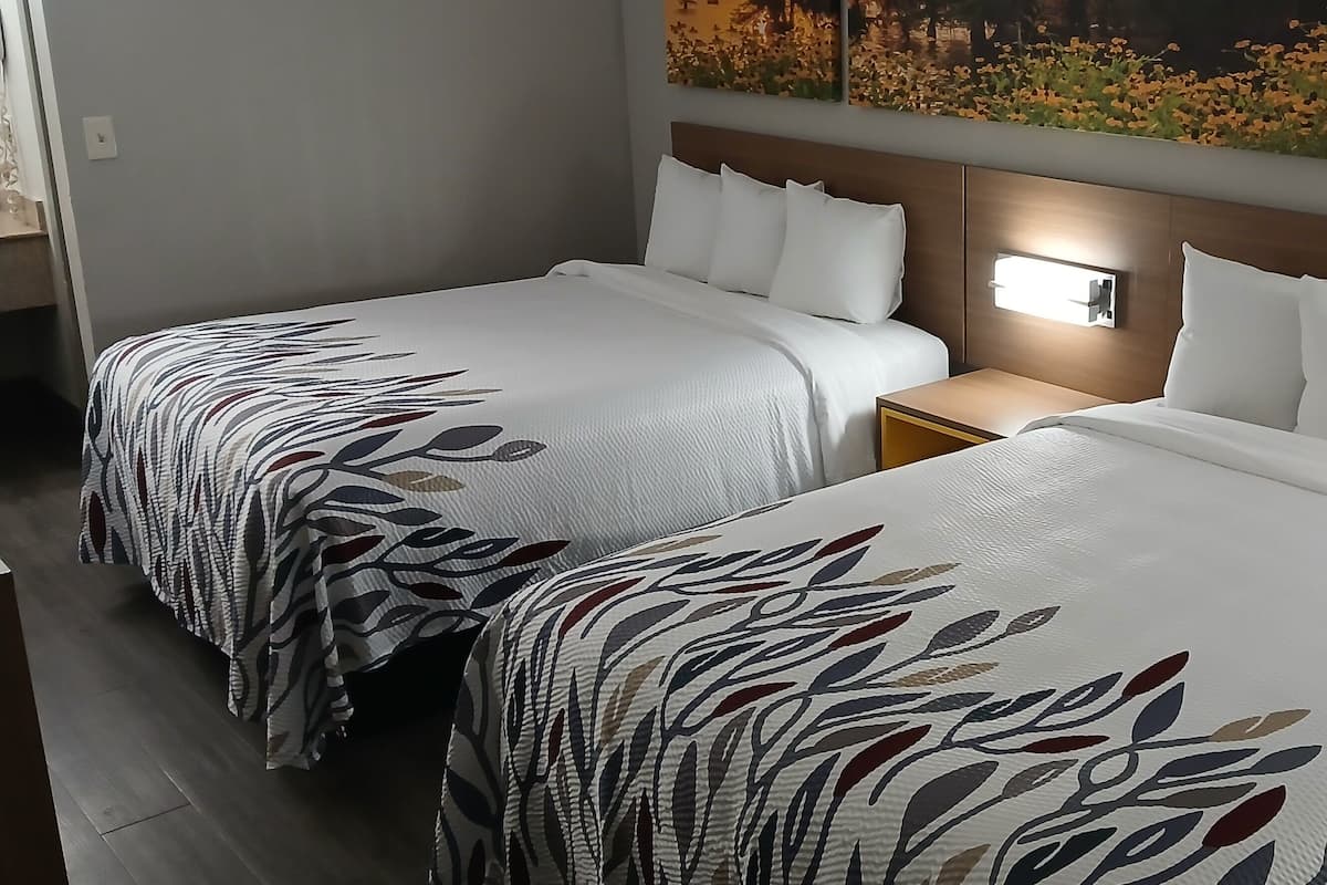 Desk, laptop workspace, free WiFi, bed sheets