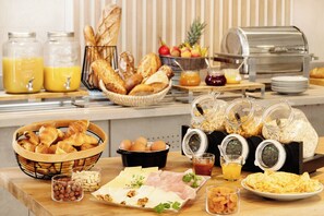 Daily buffet breakfast (EUR 18 per person)