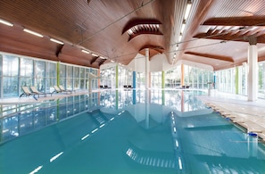 Indoor pool, outdoor pool, free pool cabanas, pool umbrellas