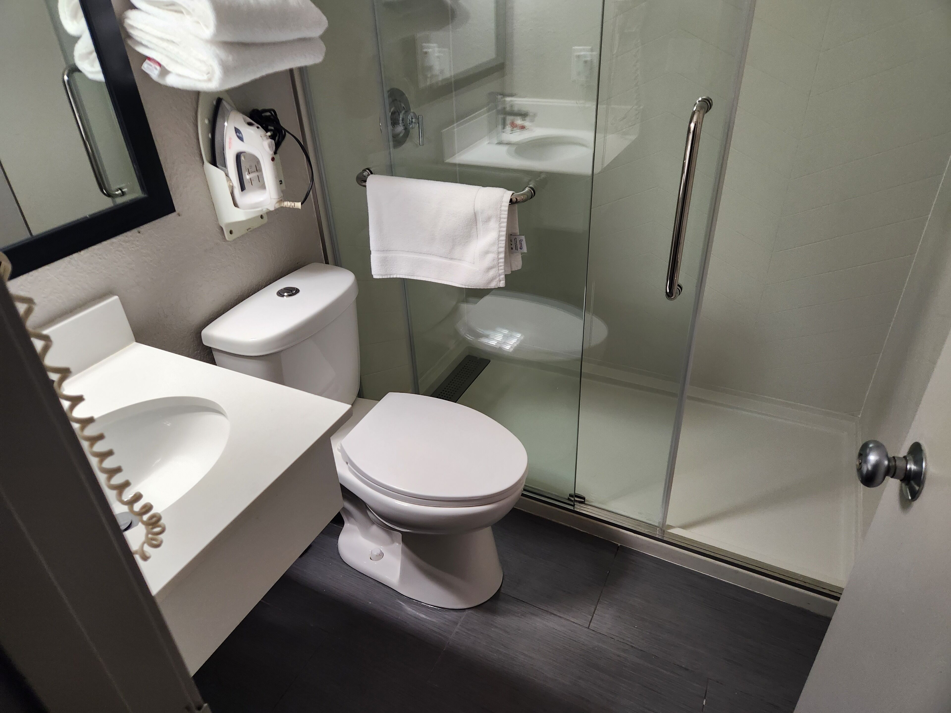 combined shower/bathtub, free toiletries, hair dryer, towels