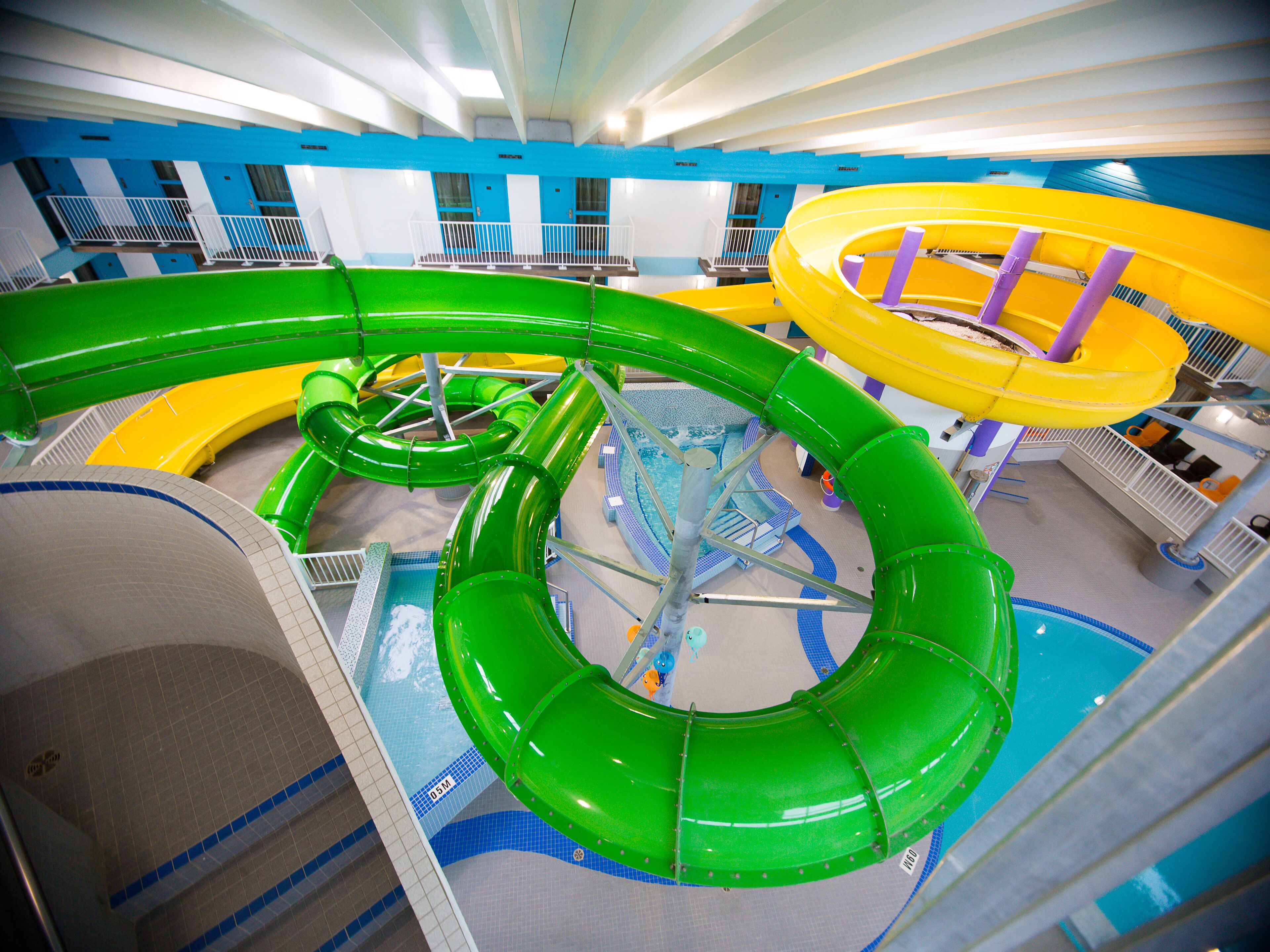 A water park with multiple slides and pools.