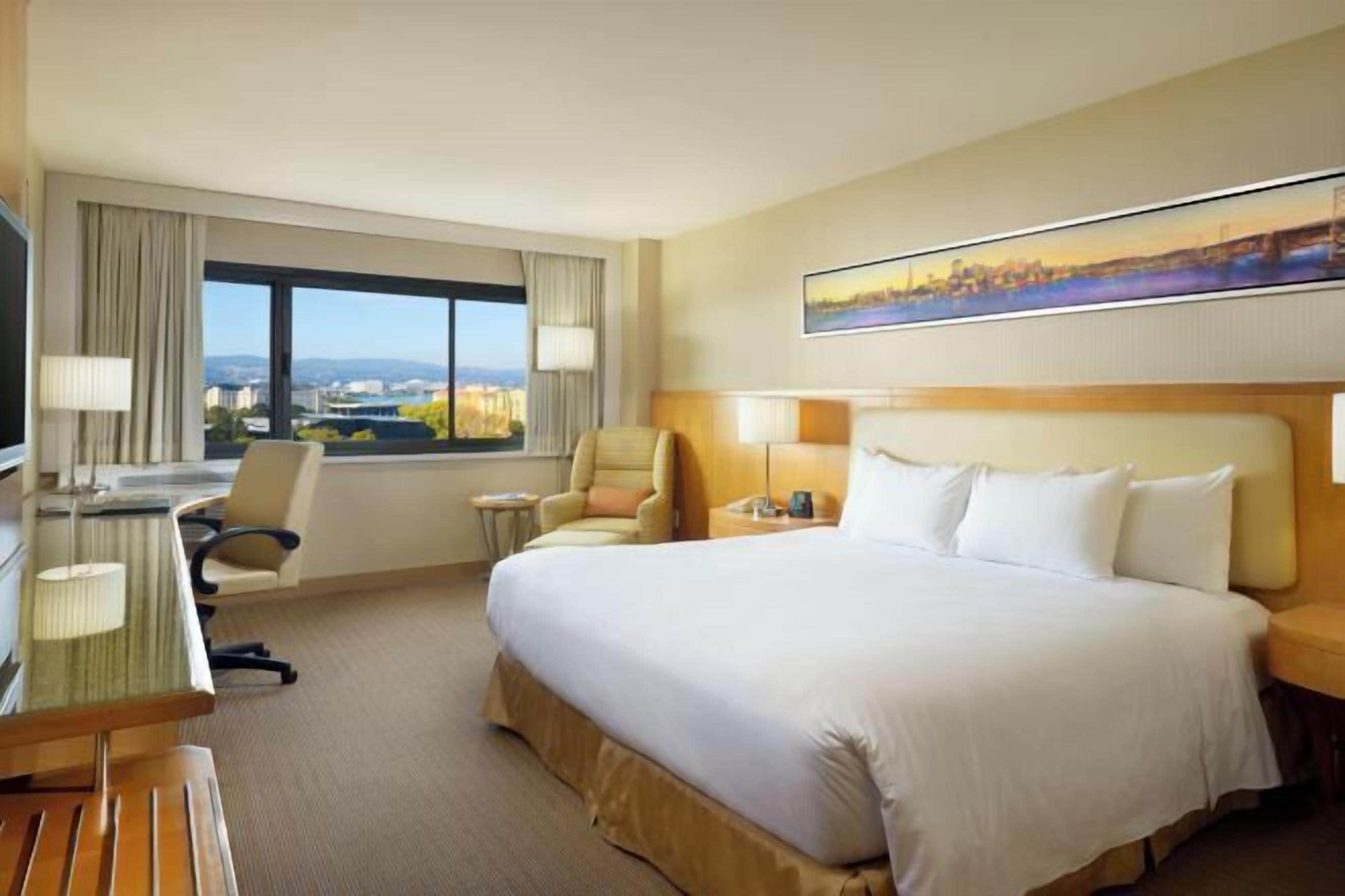 Premium bedding, pillow-top beds, in-room safe, desk