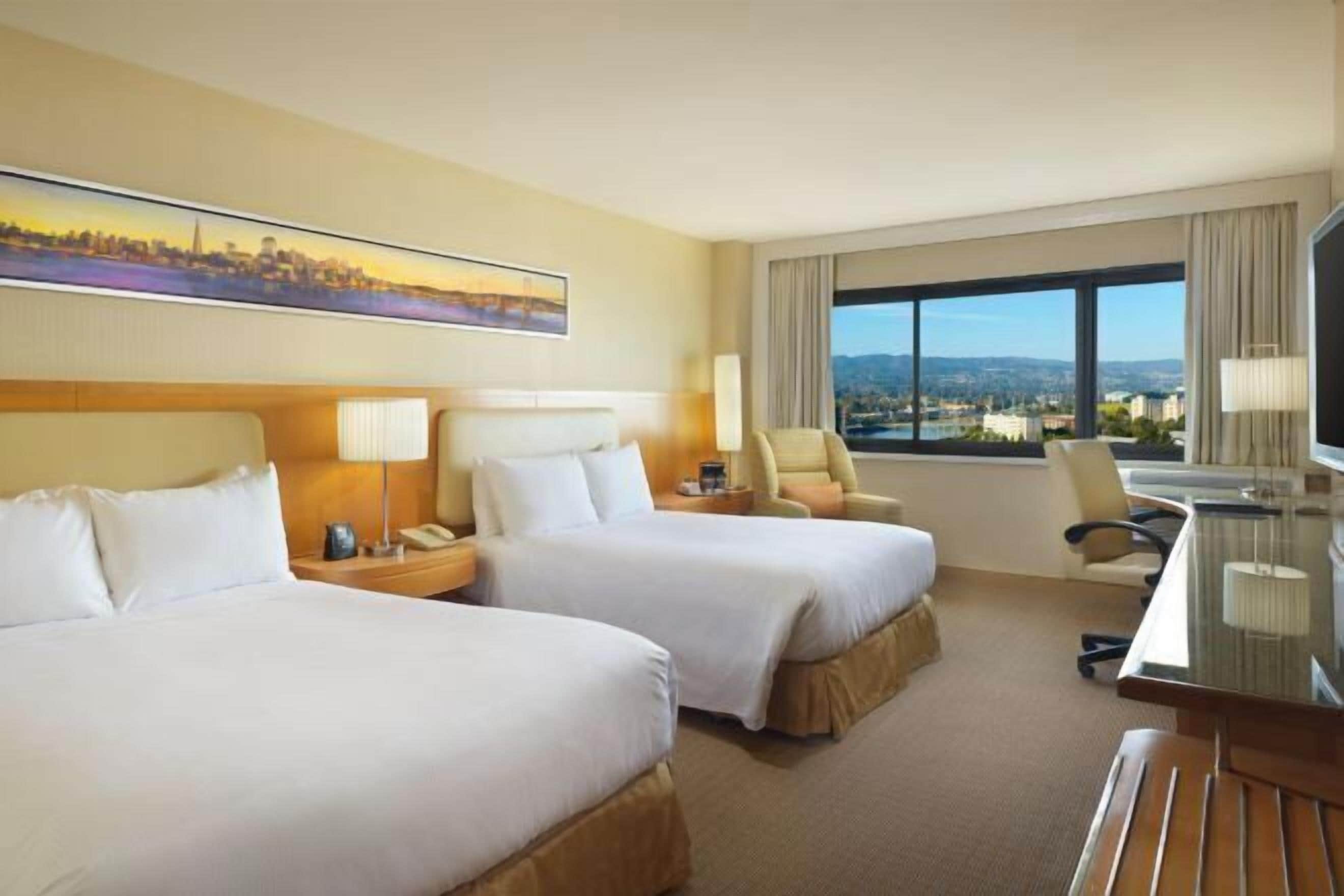 Premium bedding, pillow-top beds, in-room safe, desk