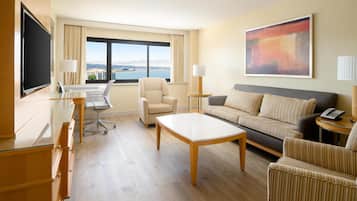 Junior Suite, 1 King Bed | Living area | 42-inch flat-screen TV with satellite channels, TV, pay movies