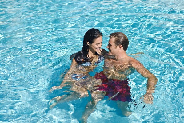 2 outdoor pools, pool umbrellas, pool loungers