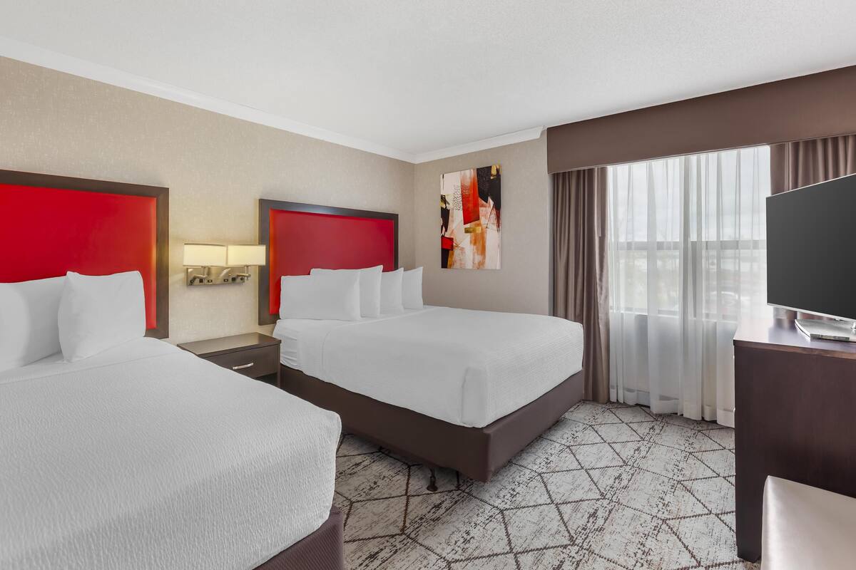 Suite, 2 Queen Beds, Non Smoking, Kitchenette (with Sofabed) | 1 bedroom, pillow-top beds, desk, laptop workspace