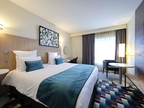 Premium bedding, Select Comfort beds, desk, blackout curtains