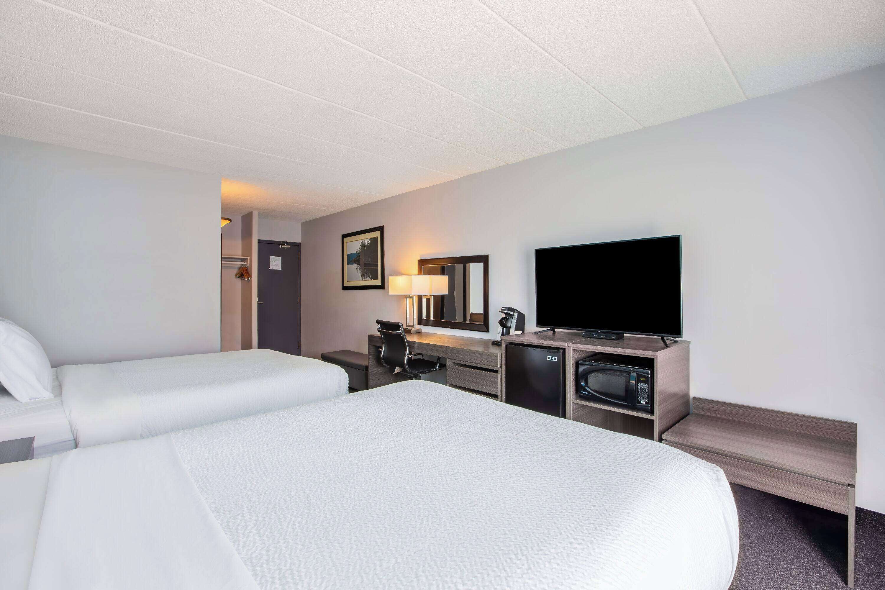 premium bedding, down duvets, pillow-top beds, in-room safe