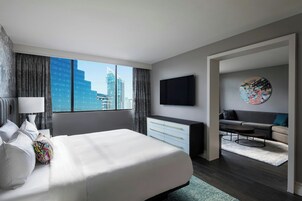 Premium bedding, down comforters, in-room safe, desk