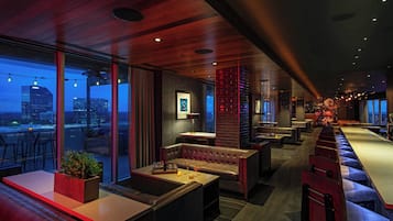 2 bars/lounges, rooftop bar, lobby lounge