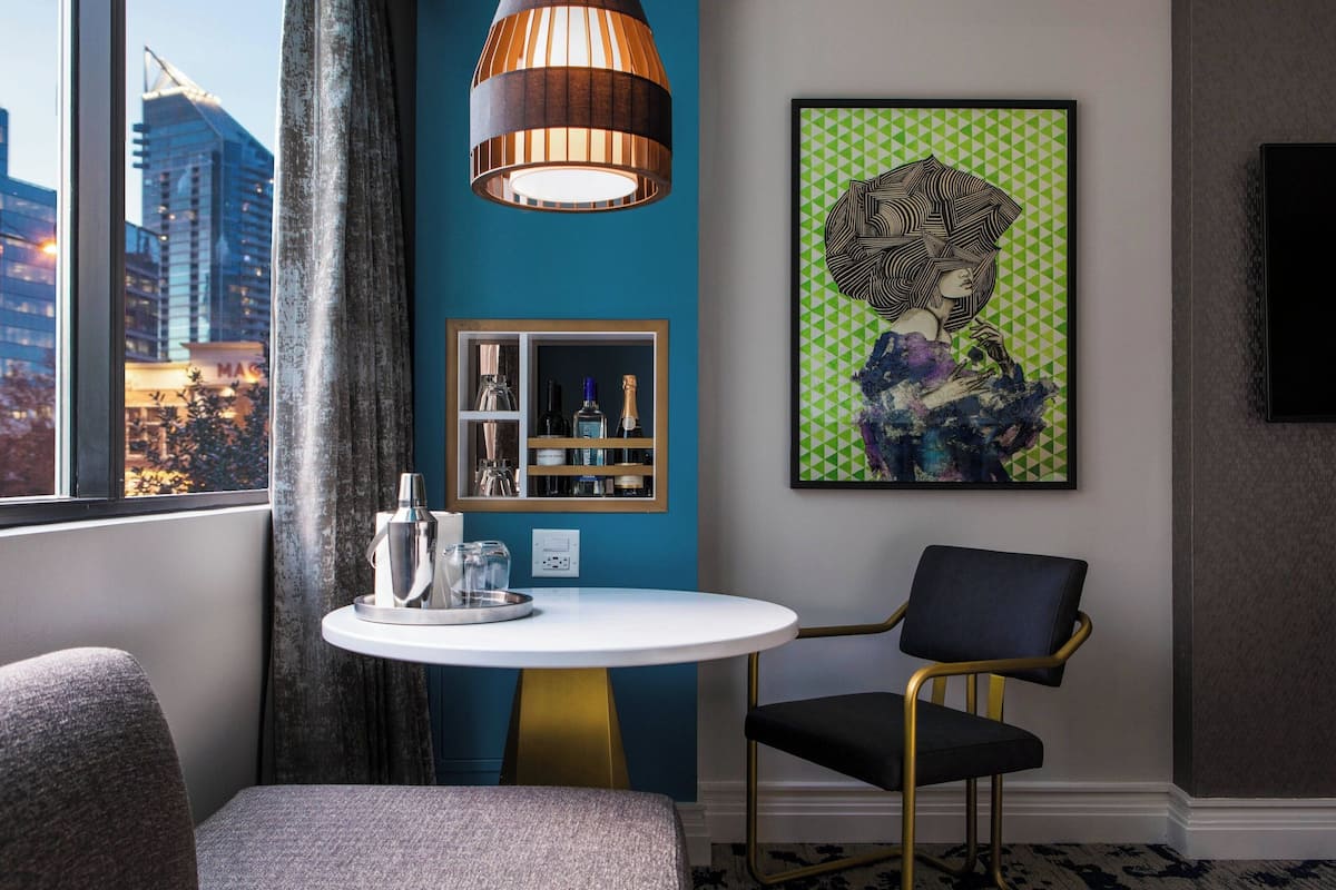 Premium bedding, down comforters, in-room safe, desk