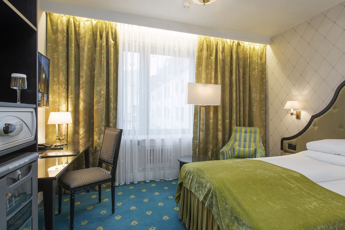 Standard Single Room, Non Smoking | Minibar, in-room safe, desk, laptop workspace