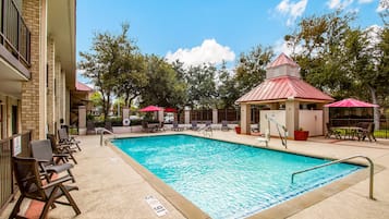 Seasonal outdoor pool, pool umbrellas, pool loungers