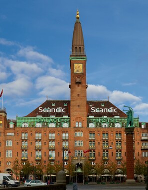 A historic building with a prominent tower, labeled as a hotel. - Scandic Palace Hotel (Copenhagen)