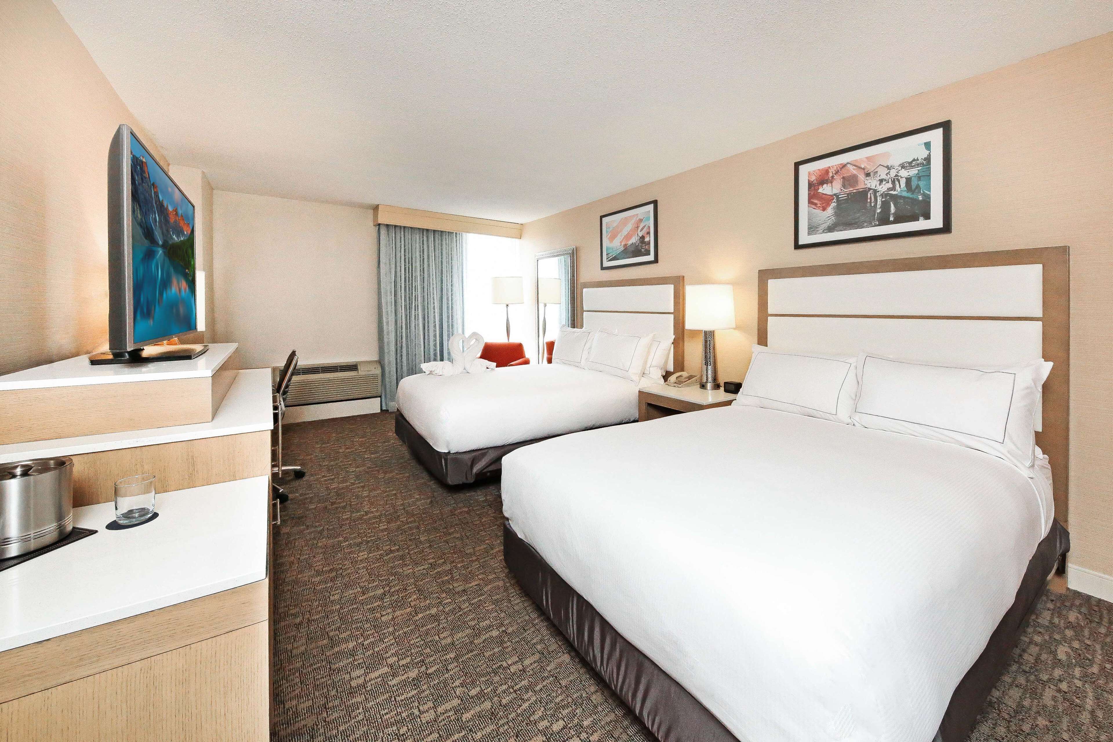 Premium bedding, down comforters, pillowtop beds, in-room safe