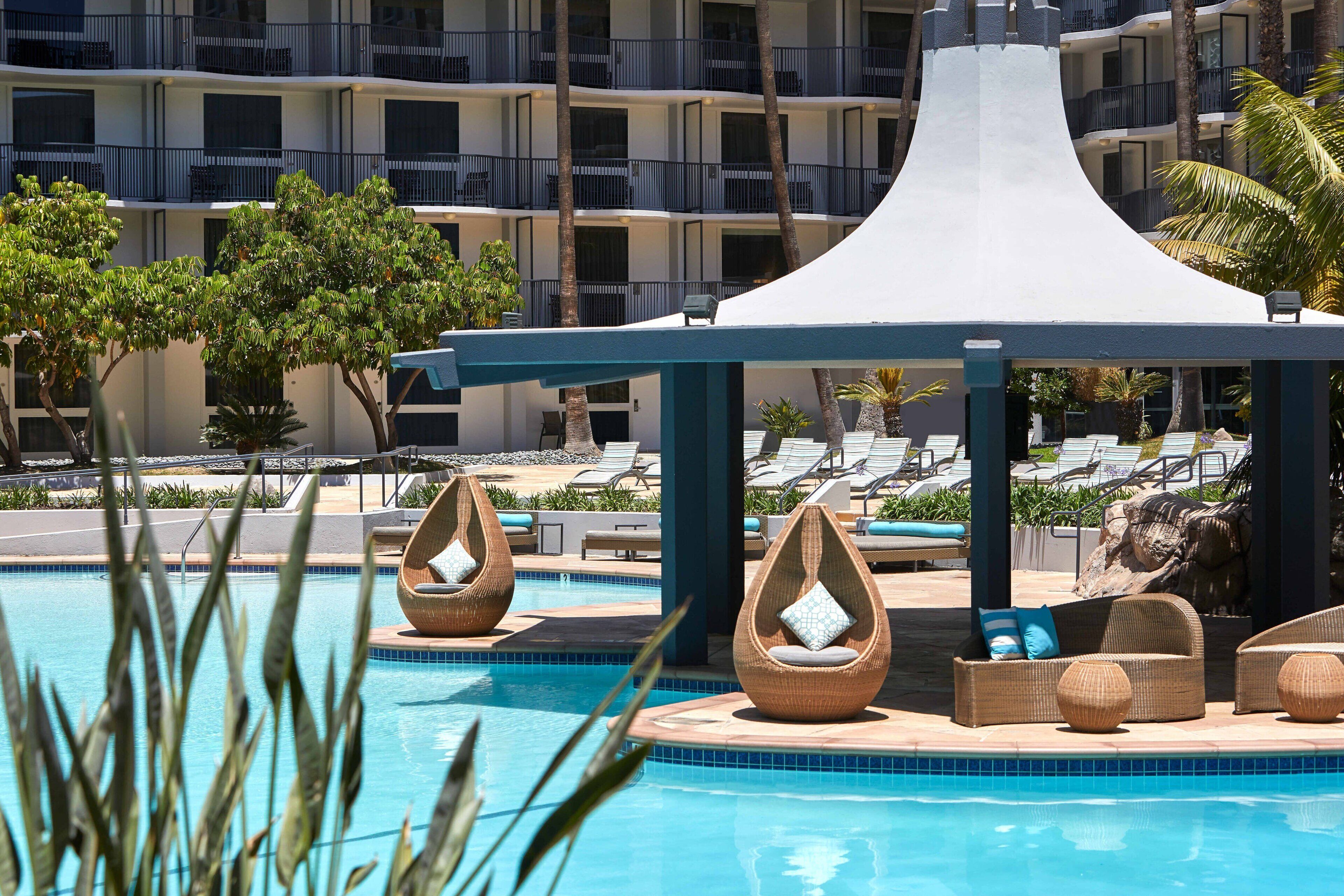 outdoor pool, open 8 am to 10 pm, pool loungers