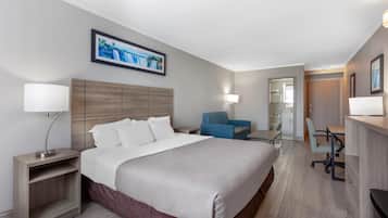 Exterior Room, 1 King Bed Suite with Sofa Bed, Non Smoking | Premium bedding, desk, iron/ironing board, free cribs/infant beds